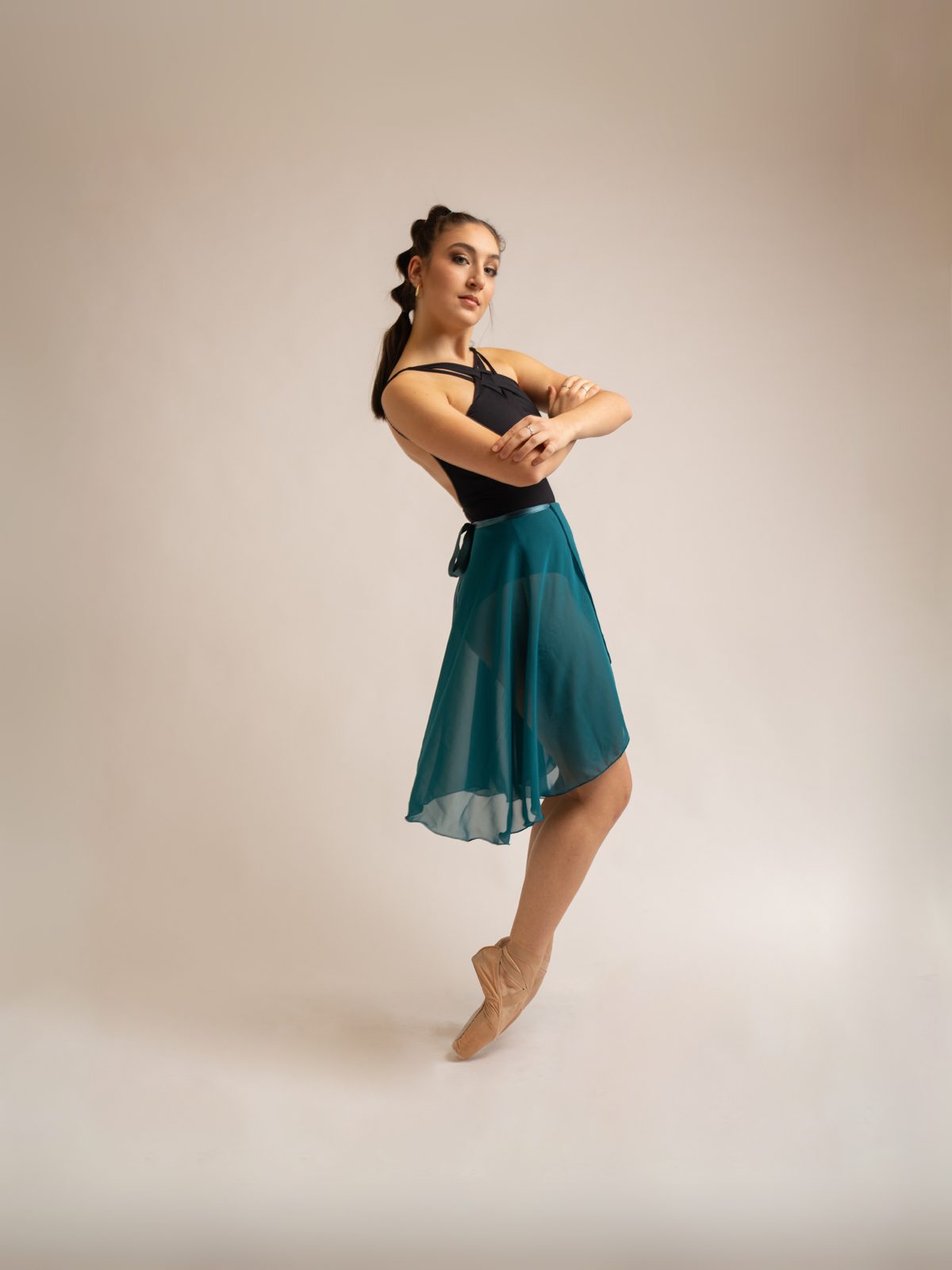 Dancer in a teal wrap skirt