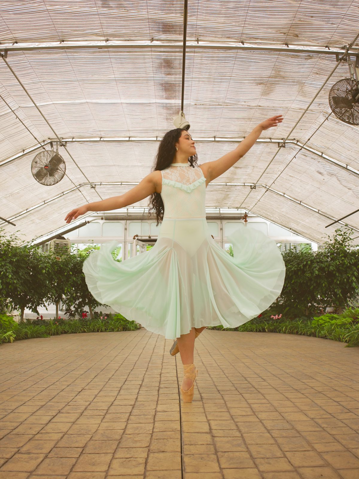 Dancer spinning in mint tulle